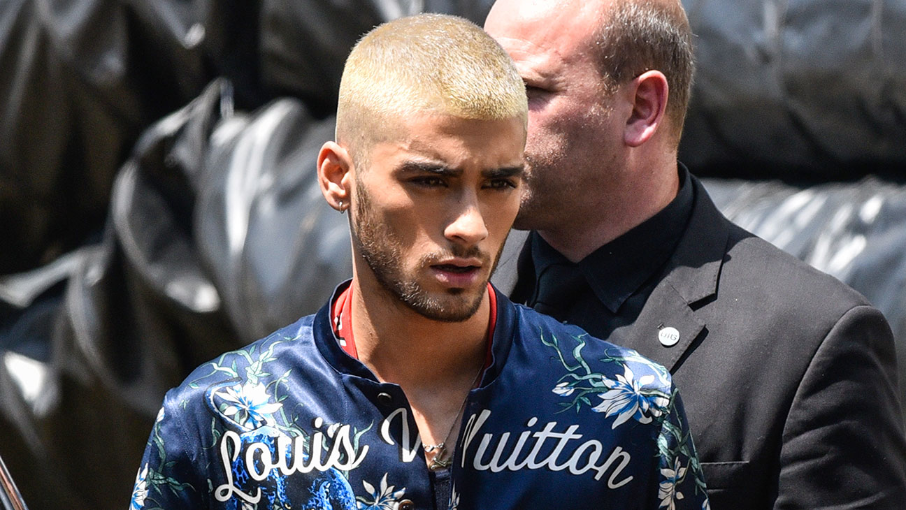 Former One Direction Band Member Zayn Malik, Of Britain, Poses After Louis Vuitton Men'S Spring/Summer 2016 Fashion Collection, During Mode A Paris, In Paris, France, Thursday, June 25, 2015. (Ap Photo/Kamil Zihnioglu)