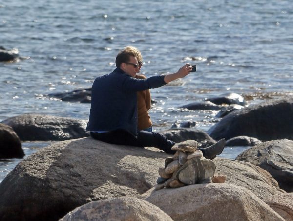 Taylor Swift Was Spotted With New Love Interest, British Actor Tom Hiddleston. The Two Were Spotted Canoodling On The Rocks Along The Beach In Westerly, Ri. In Between Kissing The Two Posed For Many Selfies. Hiddleston, Almost 10 Years Older Than Swift, Wrapped Her In His Jacket. The Couple Walked Off The Beach Holding Hands. Photo Location: Westerly Ri--Public Beach Captured 9/13/16 Sales@Theimagedirect.com Please Byline:theimagedirect.com *Exclusive Please Email Sales@Theimagedirect.com For Fees Before Use